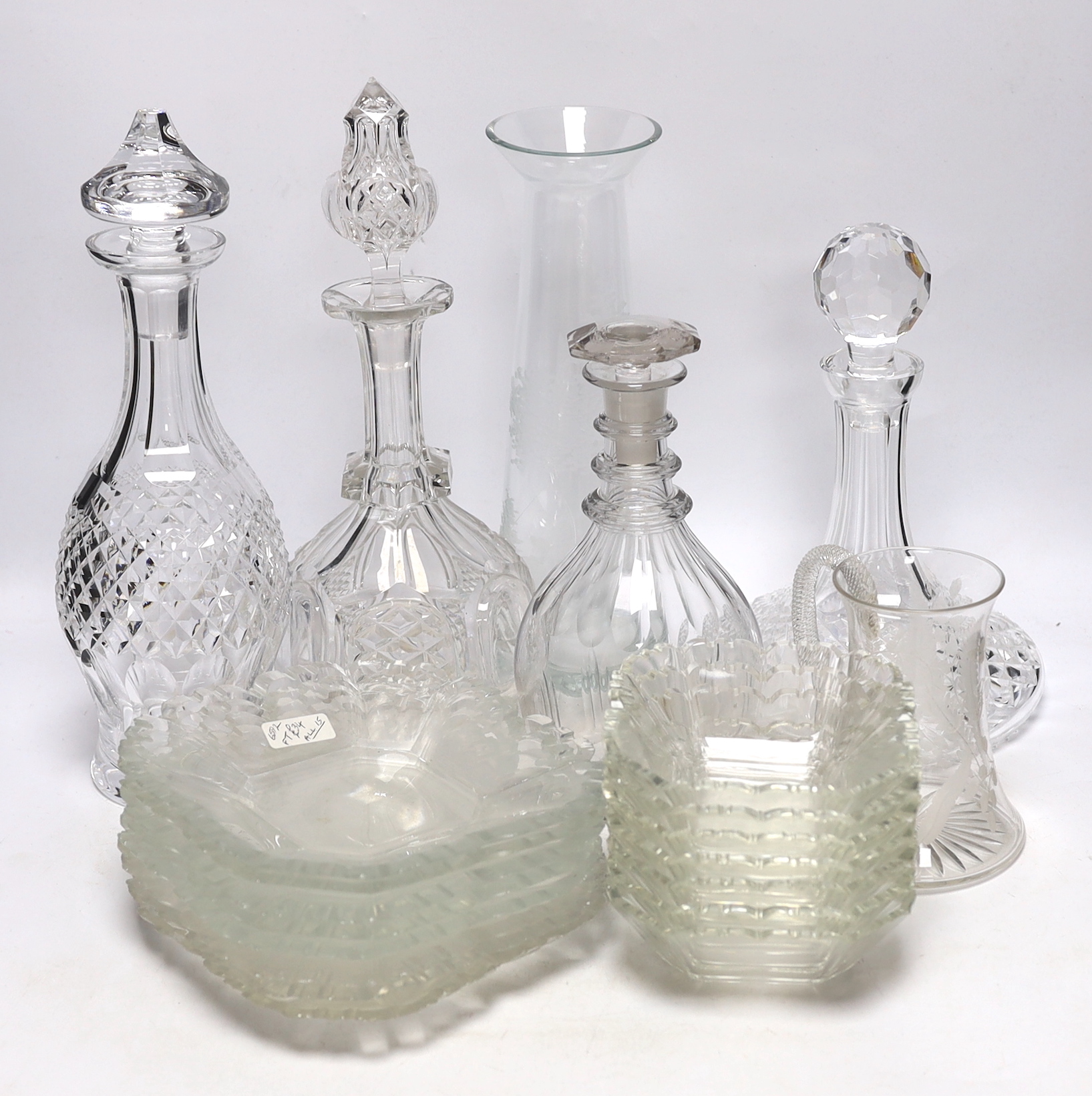 Antique and later glassware including four decanters, dishes and etched vase, largest 33cm high